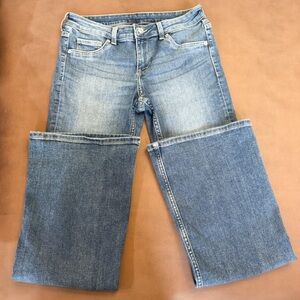 H&M DIVIDED FLARED LOW RISE JEANS